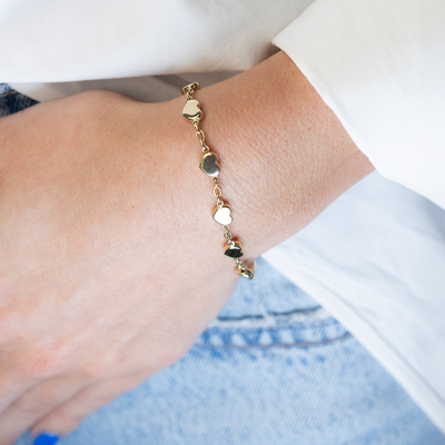 High Polished Gold Heart Station Bracelet