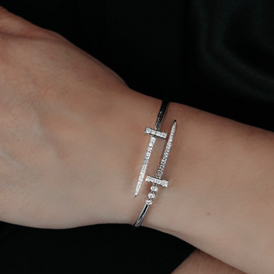 white gold sword themed bangle bracelet