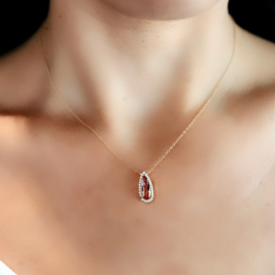 pink gemstone and diamond halo necklace