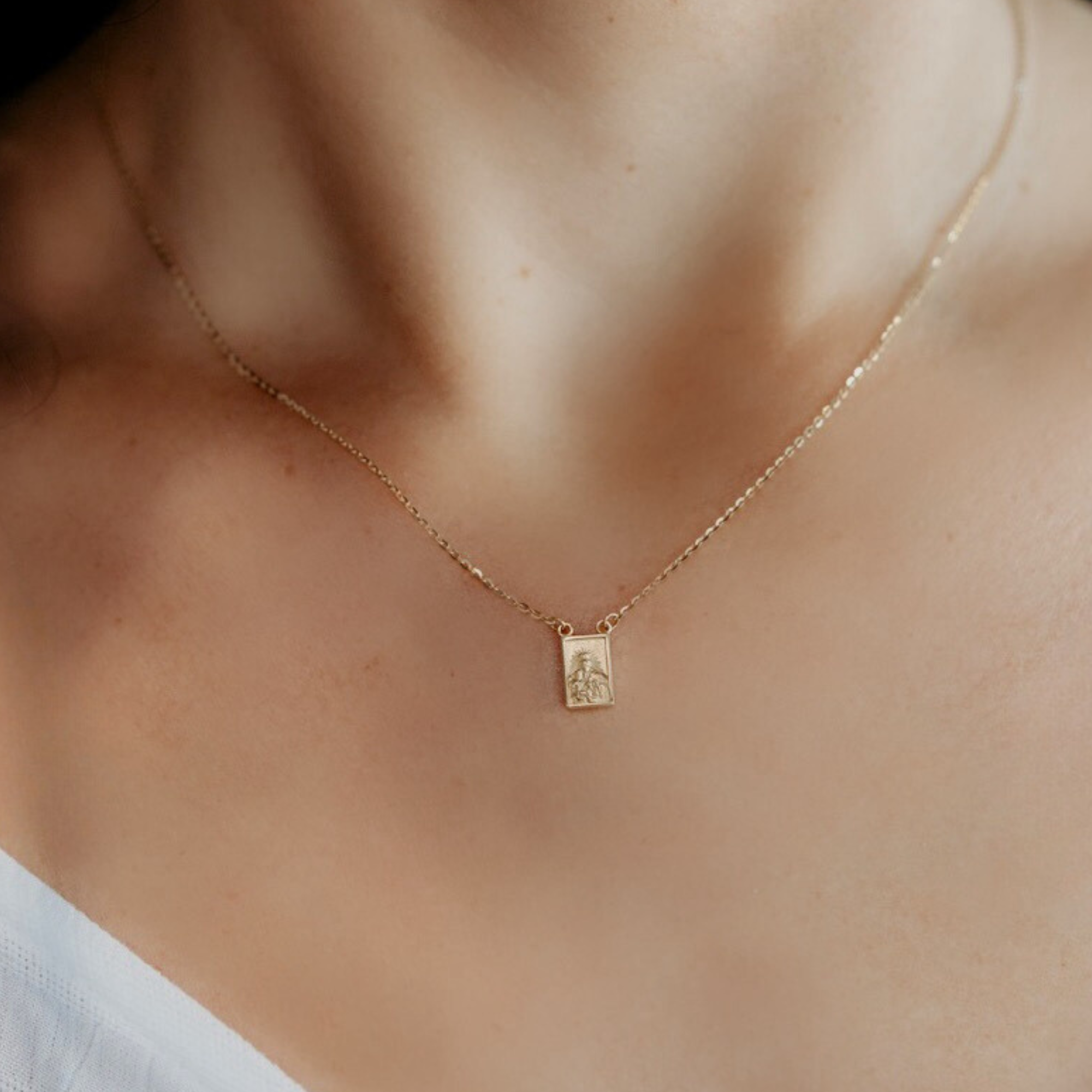 religious medal necklace