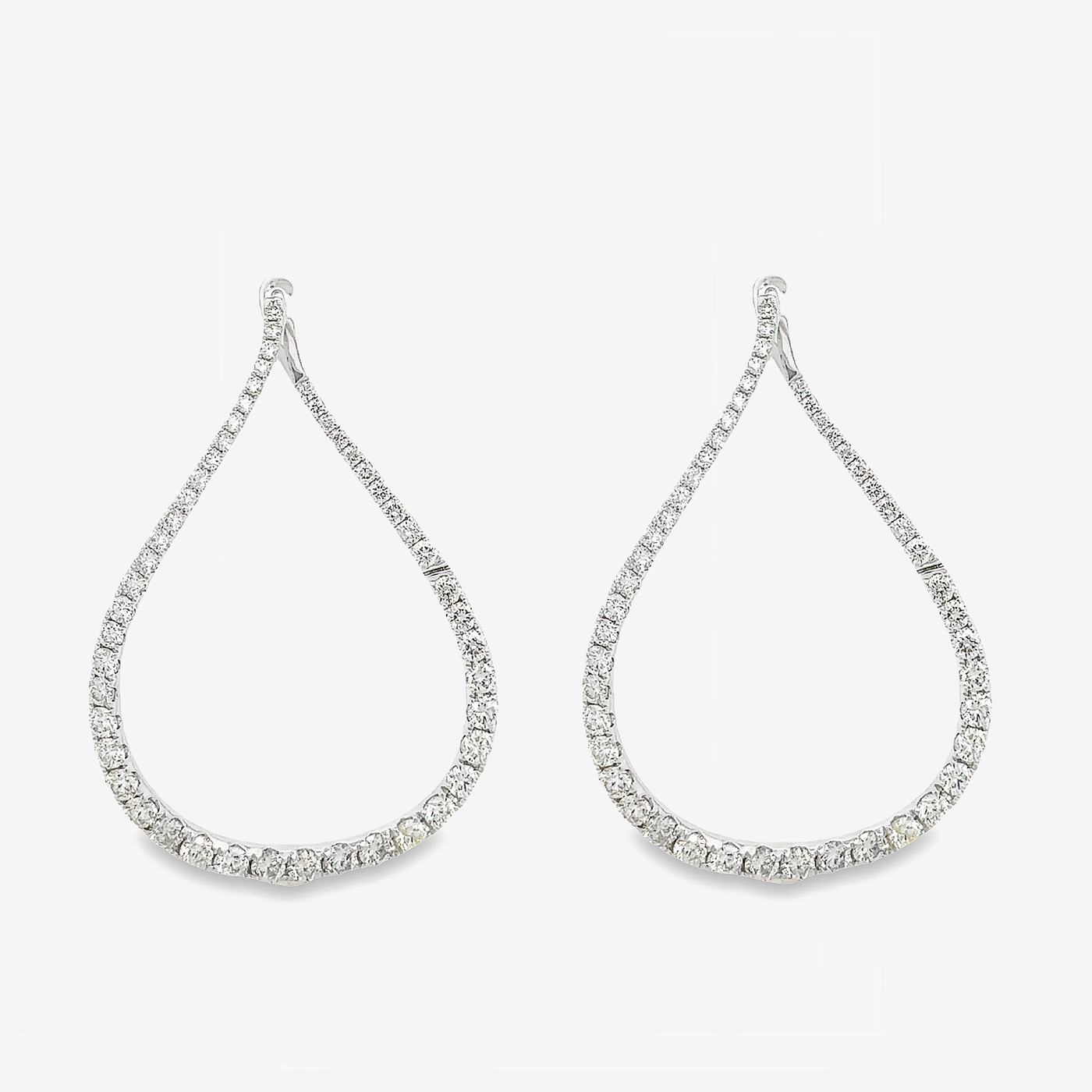 front facing wave diamond earrings