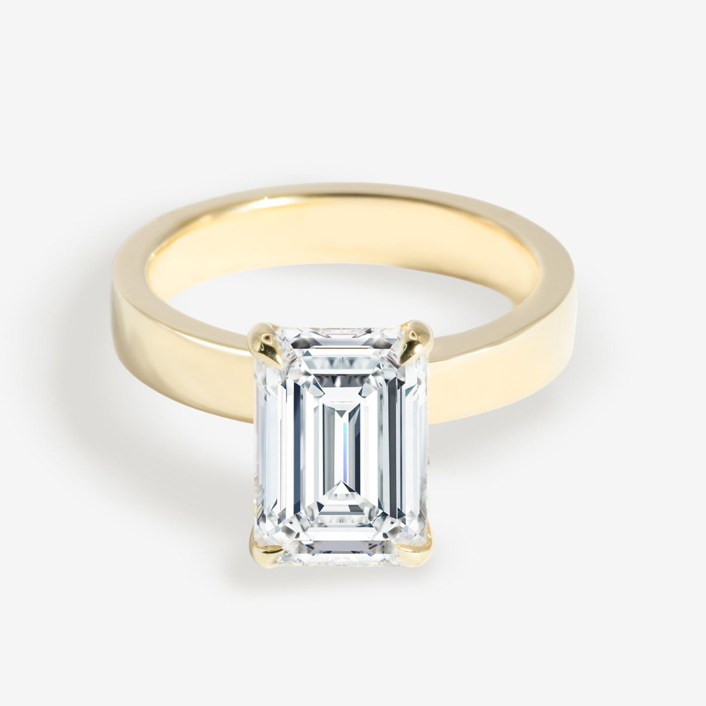 Widish Solitaire - Emerald Cut Engagement Ring
