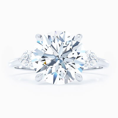 3 Stone Pear Shape Sides Round Engagement Ring