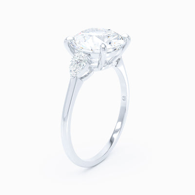 3 Stone Pear Shape Sides Round Engagement Ring