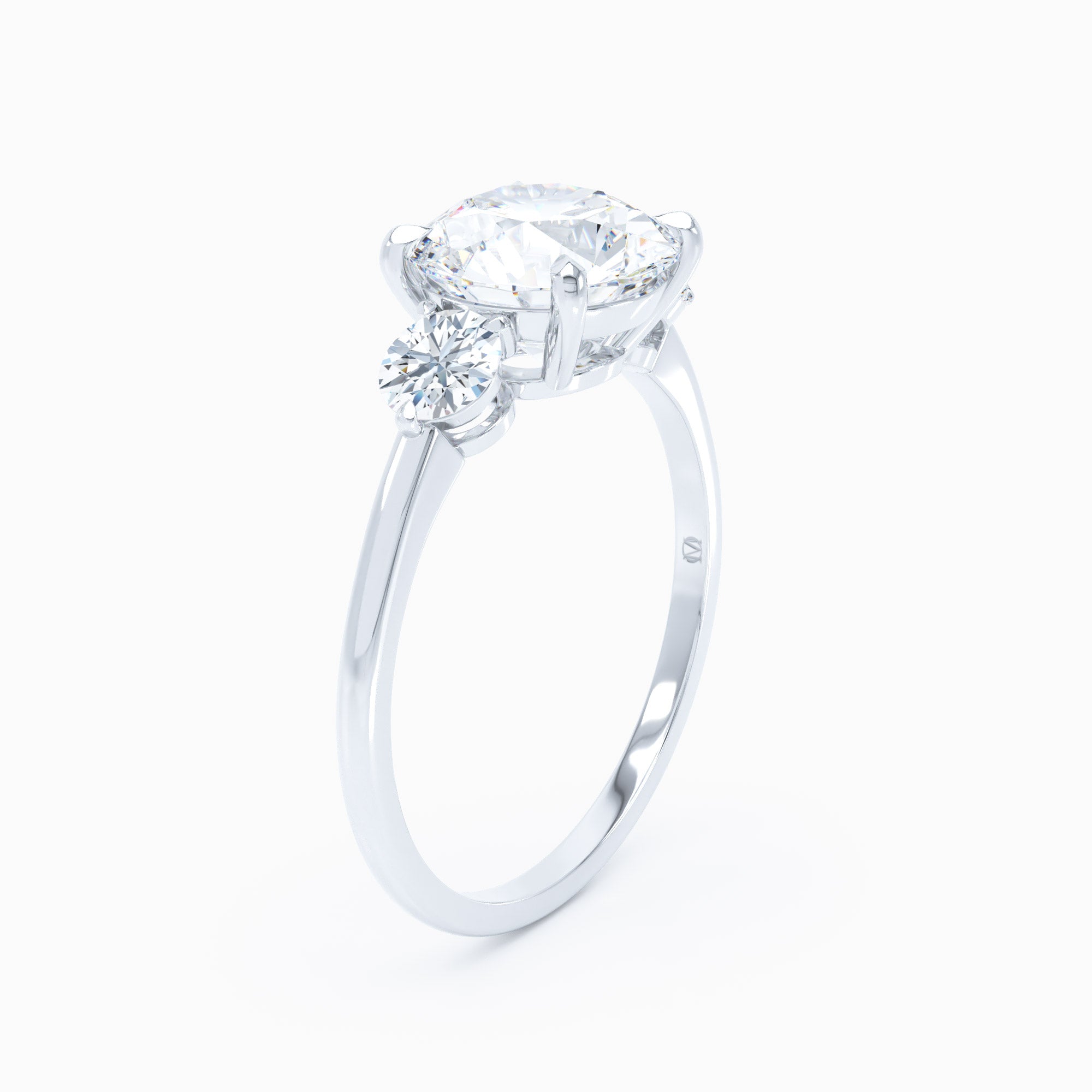 3 Stone Round Sides Round Engagement Ring