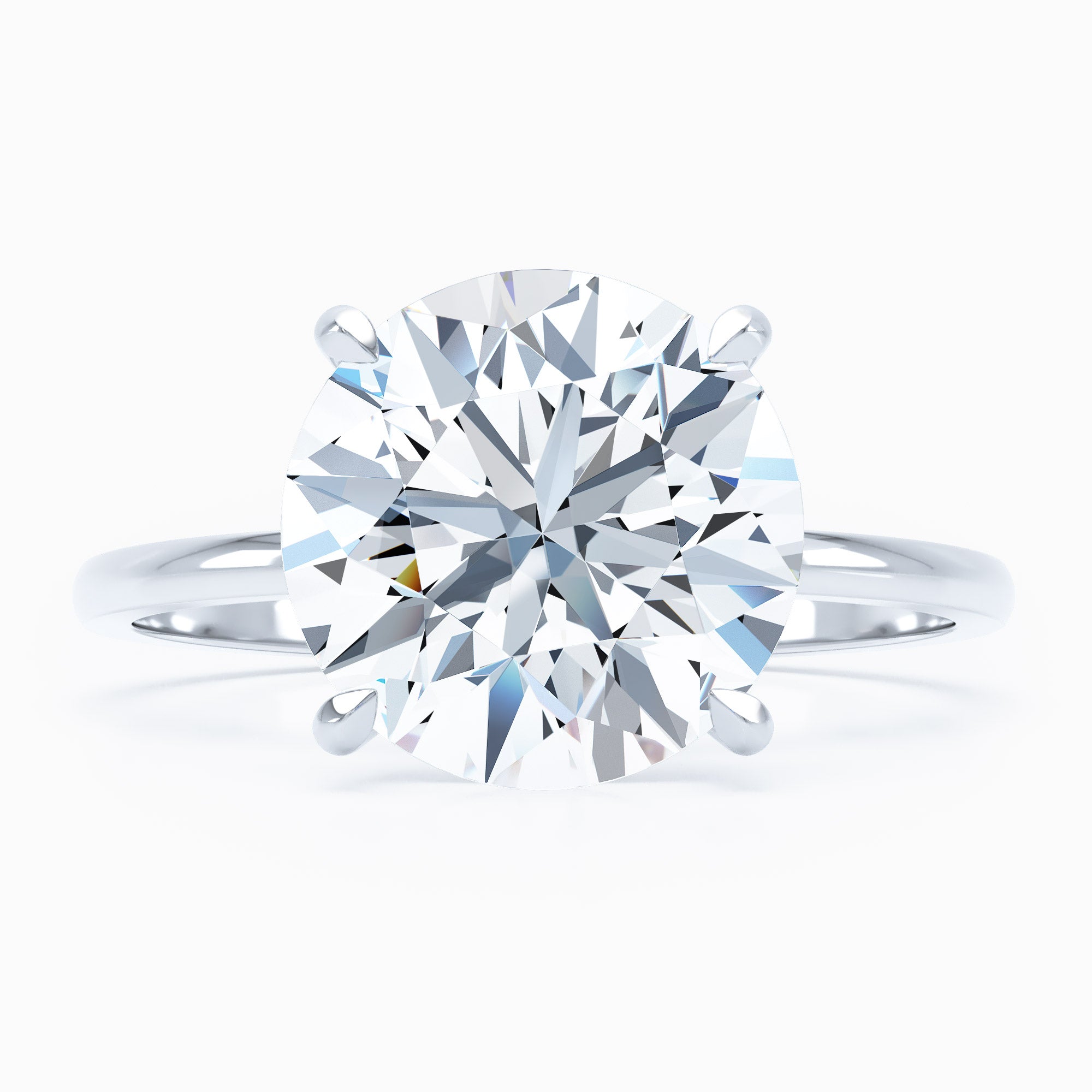 Petite Solitaire Round Engagement Ring
