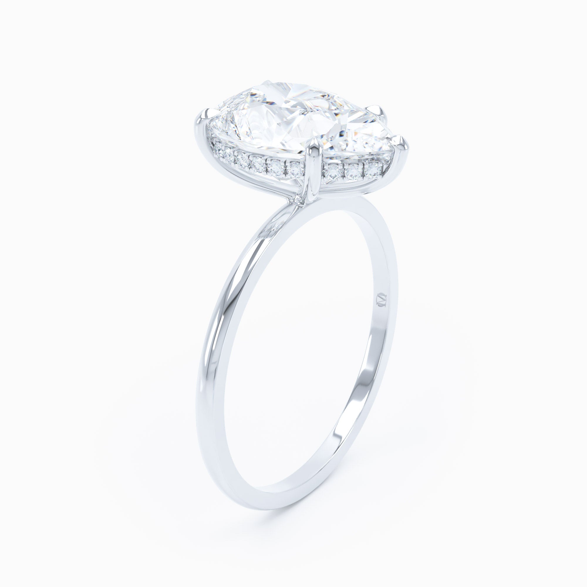Petite Solitaire Pear Engagement Ring