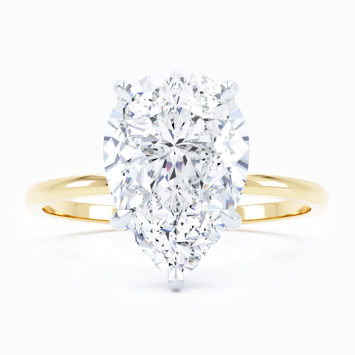 Petite Solitaire Pear Engagement Ring