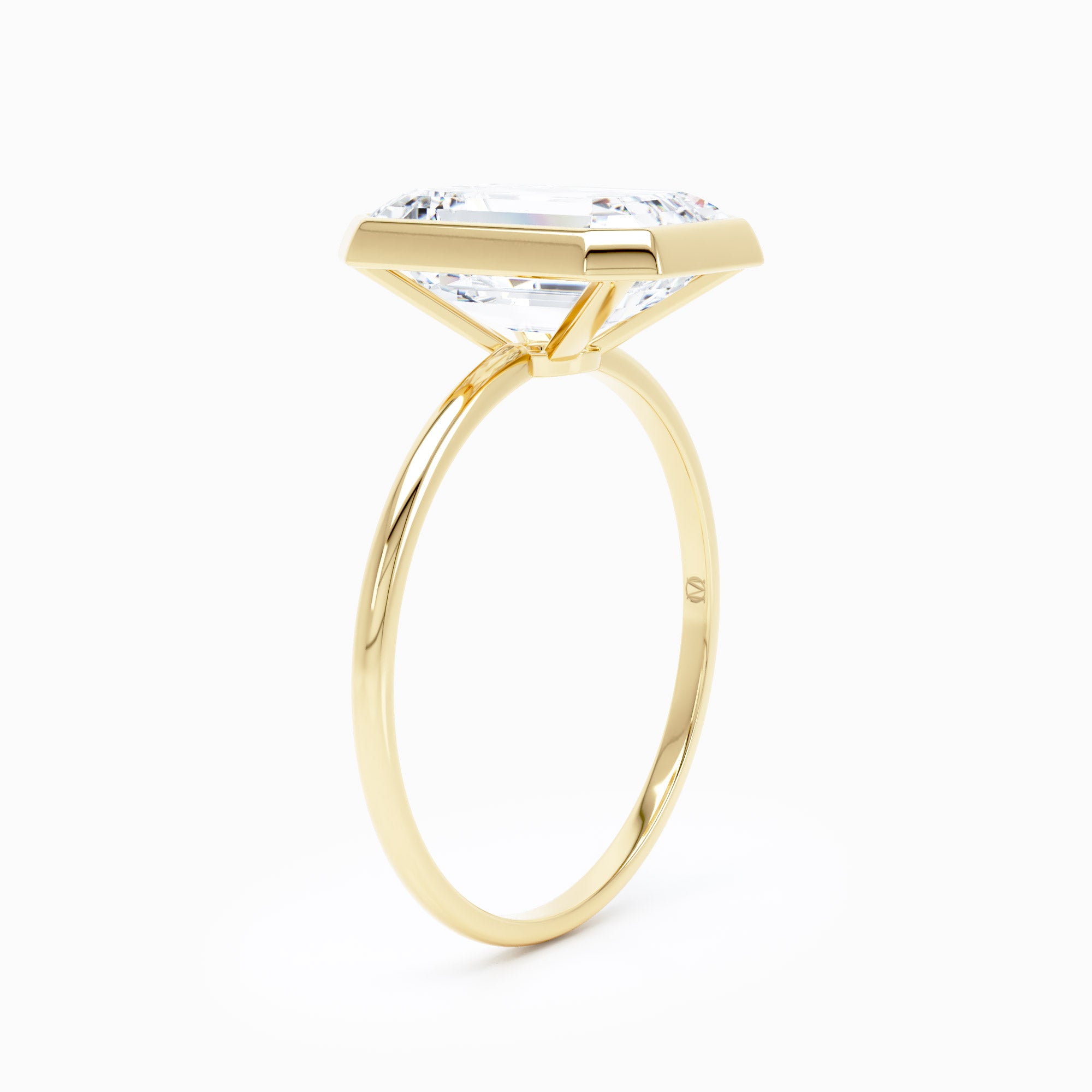 Bezel Set North South Emerald Cut Engagement Ring