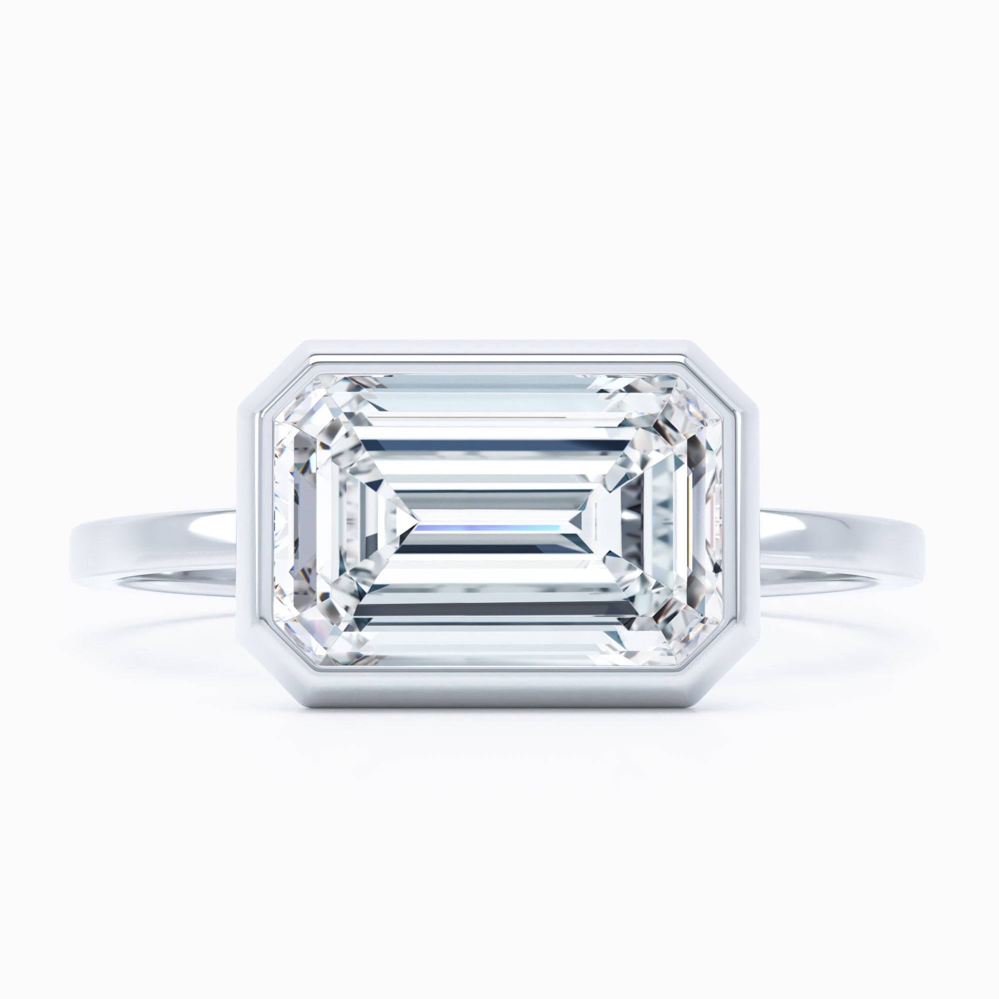 Bezel Set East West Emerald Cut Engagement Ring